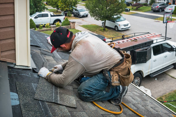 Professional Commercial Roofing technician working in Fuquay-Varina, NC